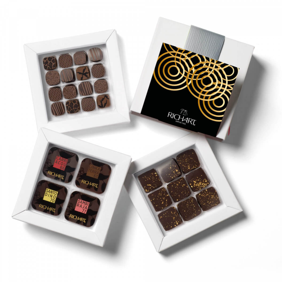 Box of 25 Gourmet Dark Chocolates. Silky ganache and dark chocolate squares. For a voyage to the origins of cocoa. Handcrafted in France.