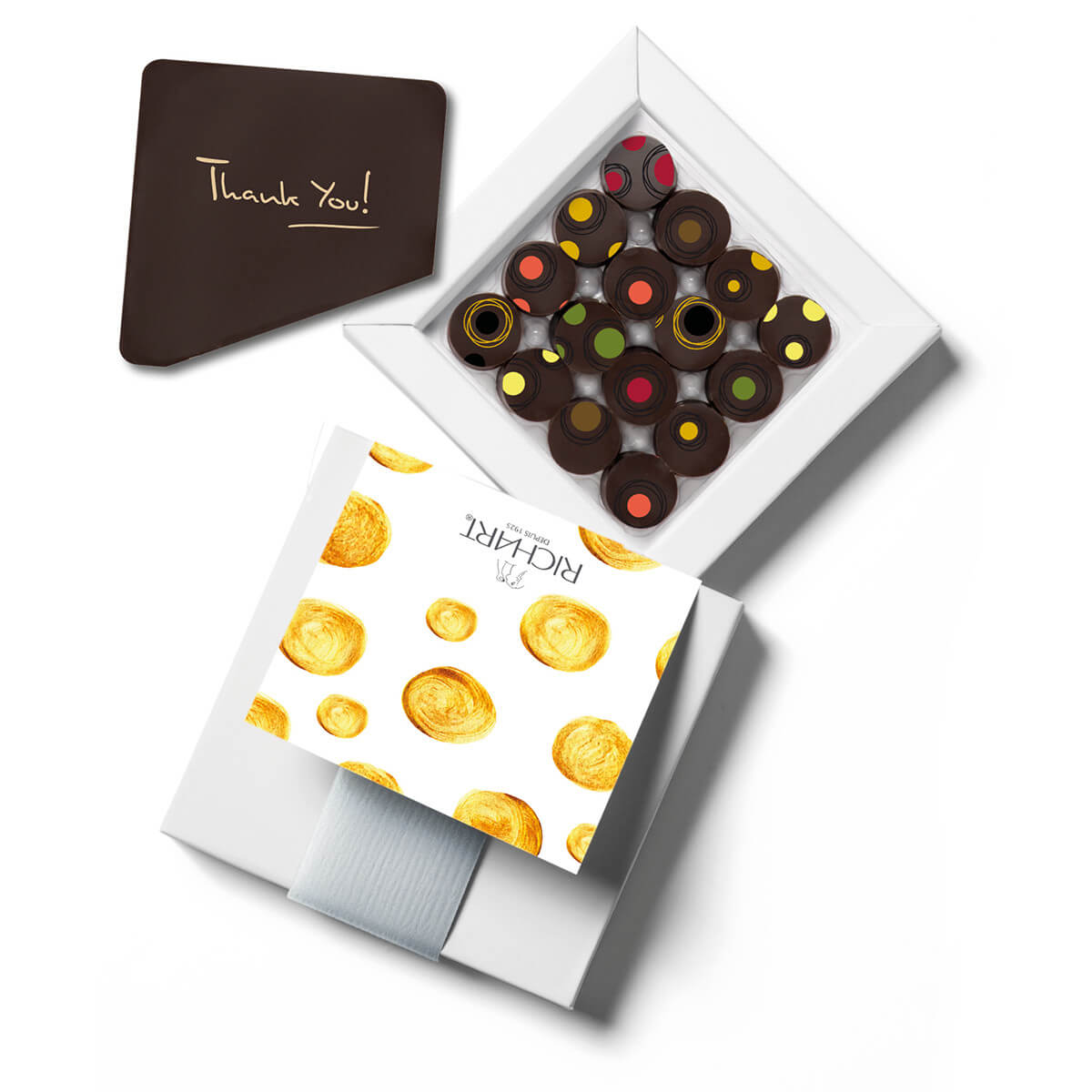 Gift Box of 16 chocolates + a "thank you" Chocolate Card.. Ganaches with liquide core. Assortment of 7 flavors. A unique experience to offer.