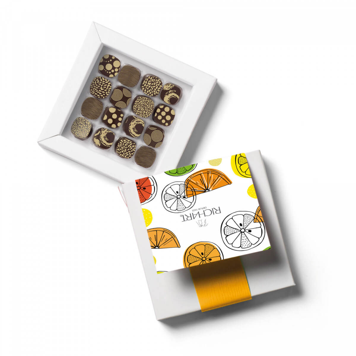Box of 16 Luxury Citrus Chocolates. Silky ganaches of fine cocoa with sweet fruity flavors : orange, tangerine, lemon, yuzu…