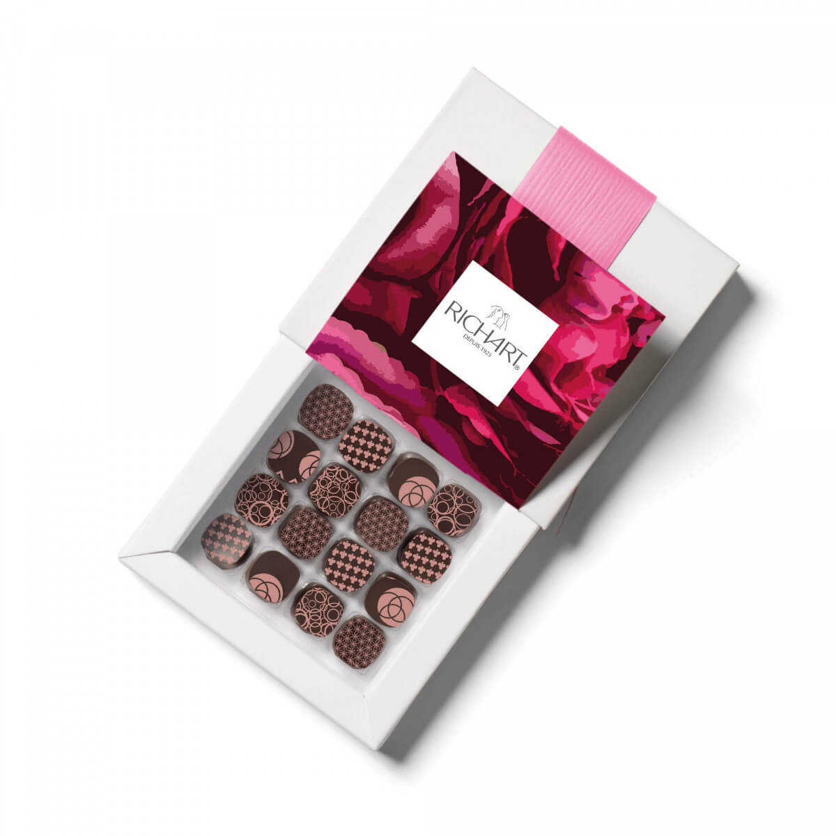 Box of 16 Filled Floral Dark Chocolates. Silky ganaches or caramel base : rose, lavender, violet, neroli…Hand-crafted in France.