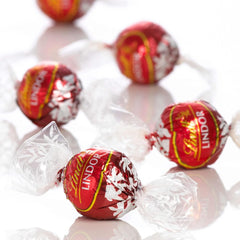 Lindt Lindor Milk Chocolate Truffles Bag - Approx 80 balls, 1 kg - Chocolate Truffles with a Smooth Melting Filling