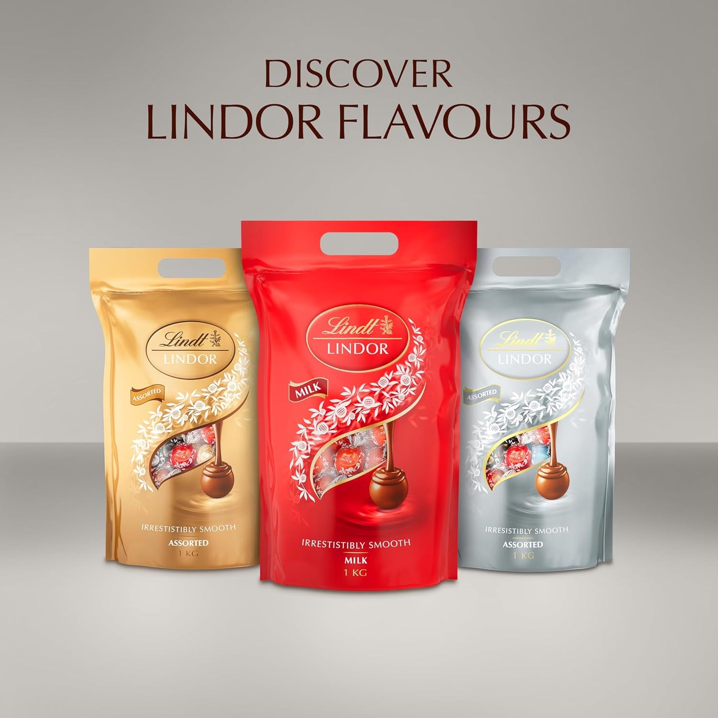 Lindt Lindor Silver Assorted Chocolate Truffles – 1kg Bag (Approx. 80 Balls) – Smooth Filling – Valentine, Christmas, Gift, Birthday, Congratulations, Sharing Treat