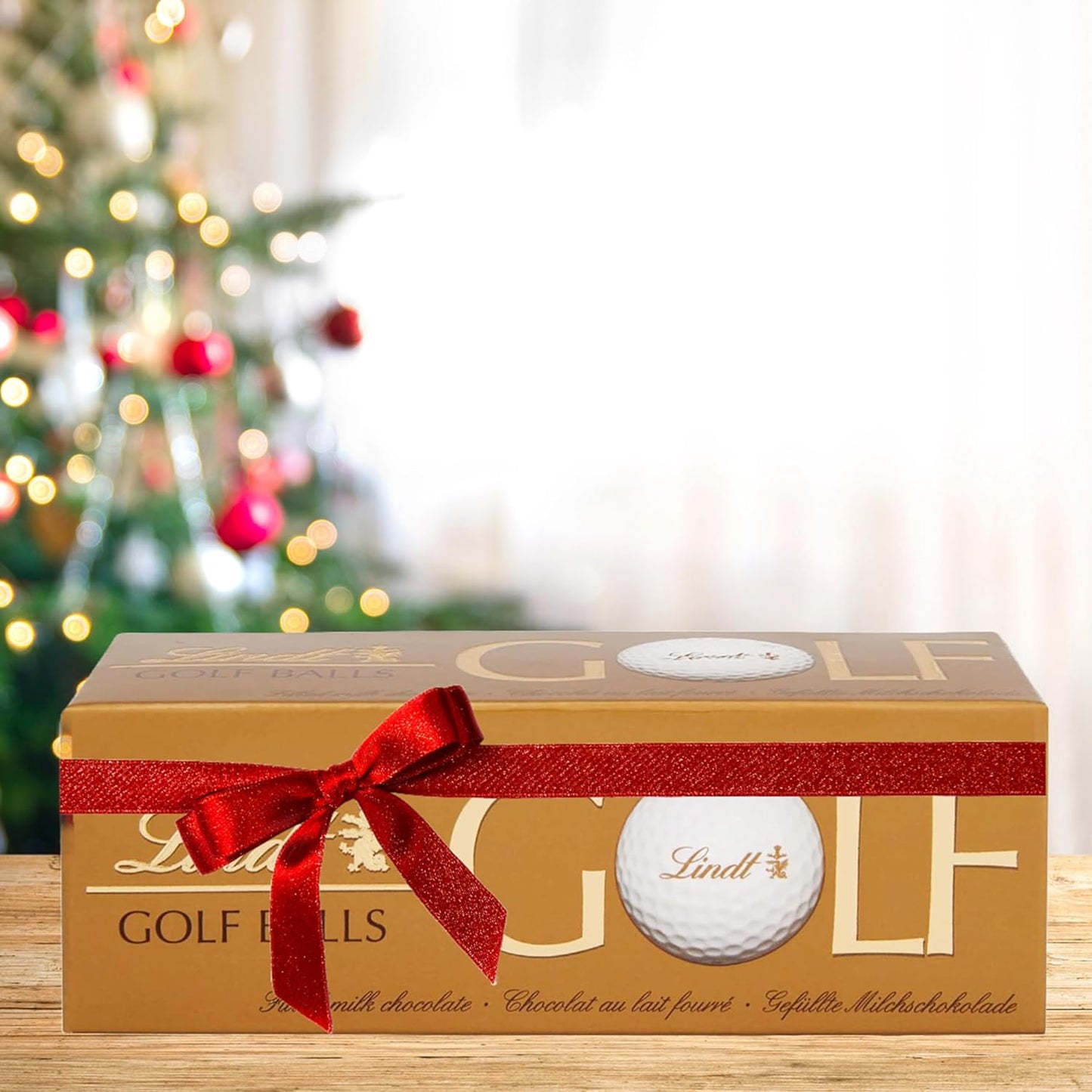 Lindt Chocolates Golf Balls for Mens Gifts - Smooth Hazelnut Filling Golf Balls 110g Chocolates Gift Box with Topline Tree Ornament. Great Christmas Gifts for Women, Stocking Fillers or Birthday Gifts