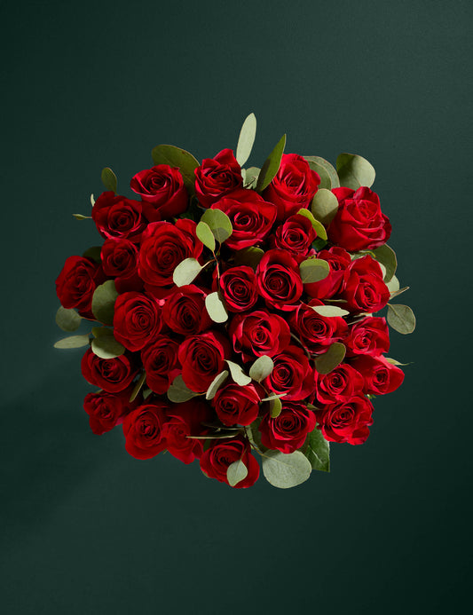 Red Freedom® Rose & Eucalyptus Bouquet with Vintage Champagne