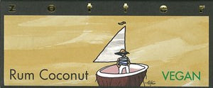 Vegan rum coconut product with sailboat illustration on a wooden background