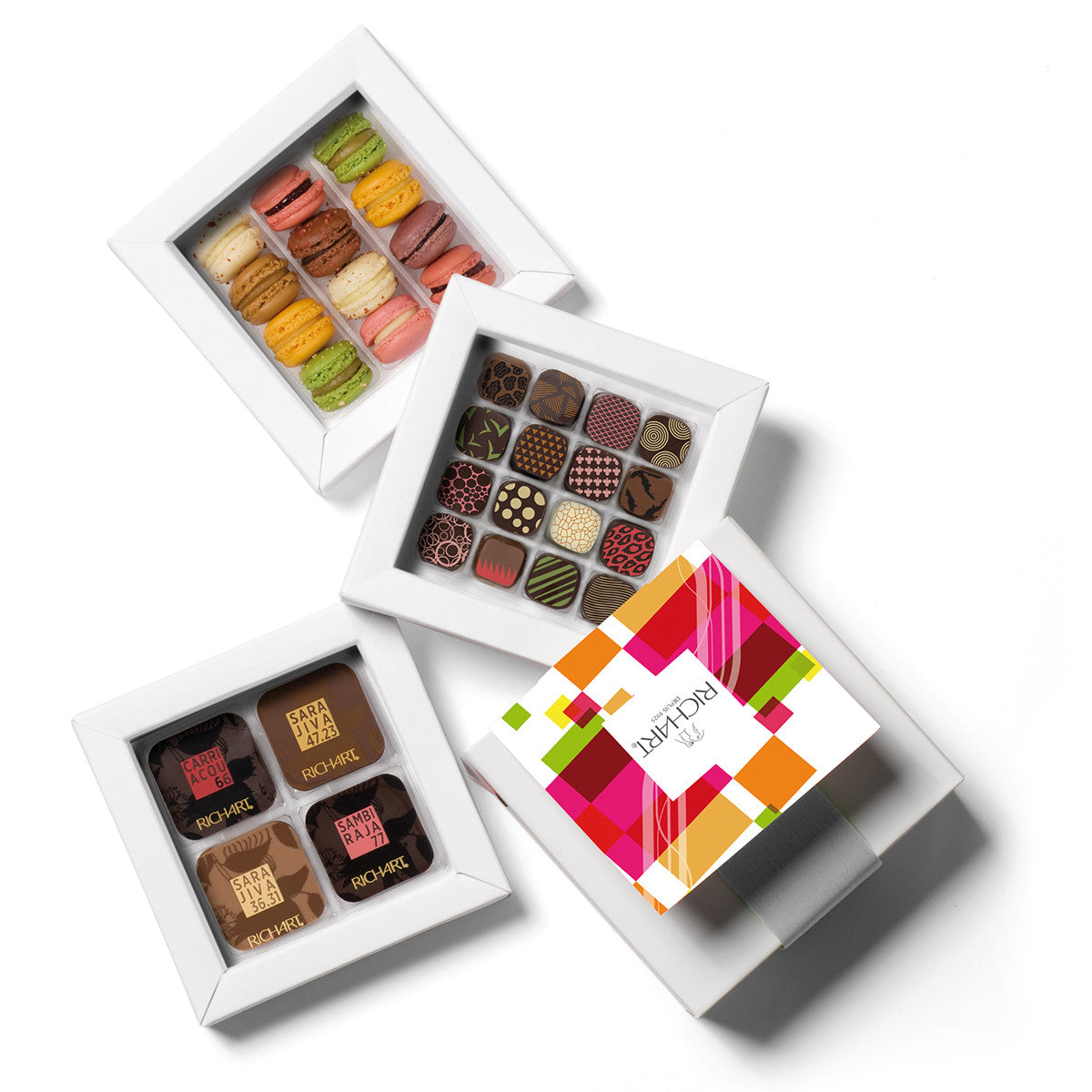 Box of gourmet treats, 32 plain and filled chocolates and 12 mini-macarons. High-end products presented in an elegant gift box.