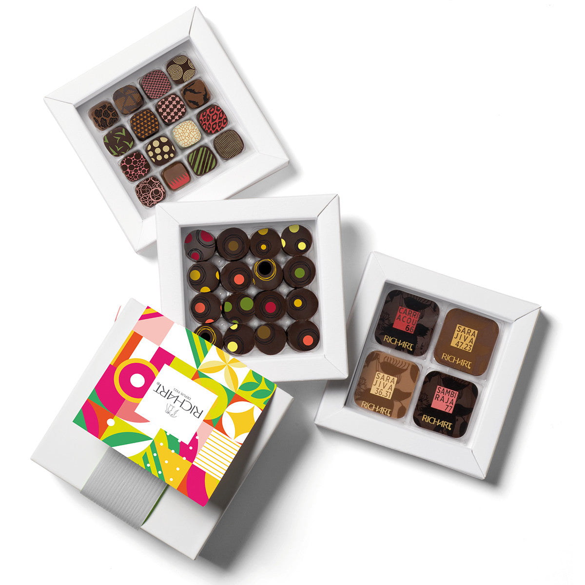 Box of gourmet treats, 48 plain and filled chocolates. High-end products presented in an elegant gift box.