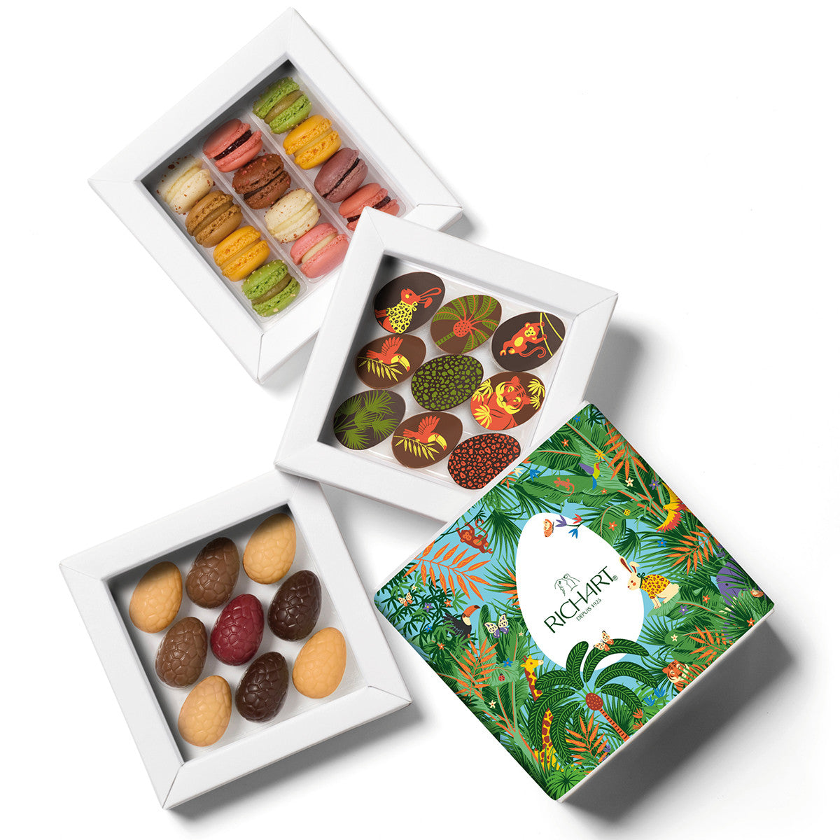 Easter gift box, 9 half-eggs, 9 filled Easter eggs and 12 macarons. High-end gourmet products presented in an elegant gift box.