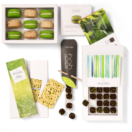 Gift Basket of 27 pieces. Theme : Herbal. 25 Chocolates, 9 French Macarons, 1 Chocolate Bar.