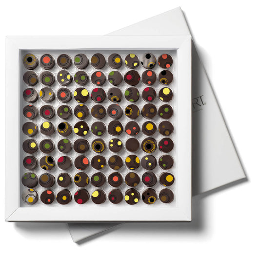 Gift Box of 81 Fine Chocolates 7 flavors. Ganaches with liquide core with a bubble of infusion : vanilla, caramel, mint or fruity.