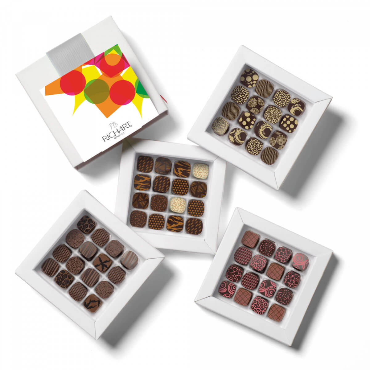 Gift box of 64 filled Dark Chocolates. Iconic collection of the french chocolatier Richart. Traditional and exotic flavors.