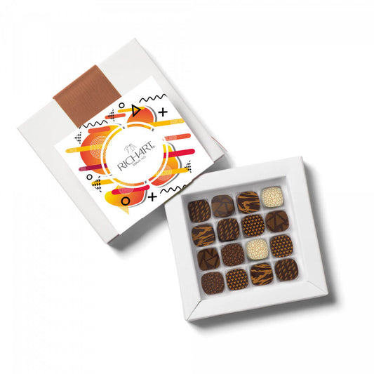 Box of 16 Filled Luxury Dark Chocolates. Perfect harmony of the roasted nut aroma and caramel. Iconic collection of the french chocolatier Richart.