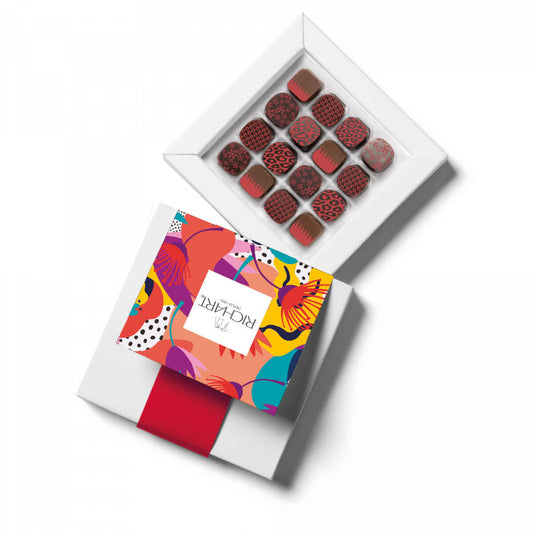 Box of 16 Filled Spicy Chocolates. Original spicy sensations.Cool of hot notes, always exotic : pink-red pepper, cinnamon, curry… Made in France