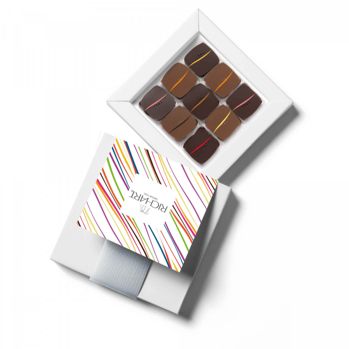Box of 9 Gourmet Chocolates of the iconic collection Rendez-Vous. Hand-crafted in the purest French tradition. Dark and Milk filled Chocolates.