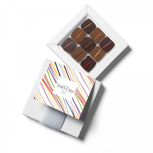 Box of 9 Gourmet Chocolates of the iconic collection Rendez-Vous. Hand-crafted in the purest French tradition. Dark and Milk filled Chocolates.