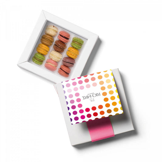 Box of 12 French Mini-Macarons. The tasting experience in an unique tiny macaron. Dark Chocolate, Pistachio, caramel, vanilla, raspberry...