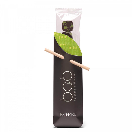 9 filled Gourmet Chocolates Thyme Praline. Individual sleeve. Perfect as an original Gift, as an attention or just as a personal treat.