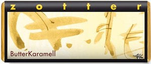 Butter Karamell Zott chocolate bar packaging with gold text on a black background