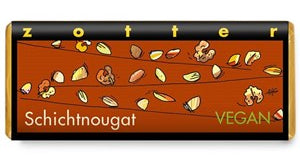 Vegan chocolate bar packaging with a brown background and gold accents.